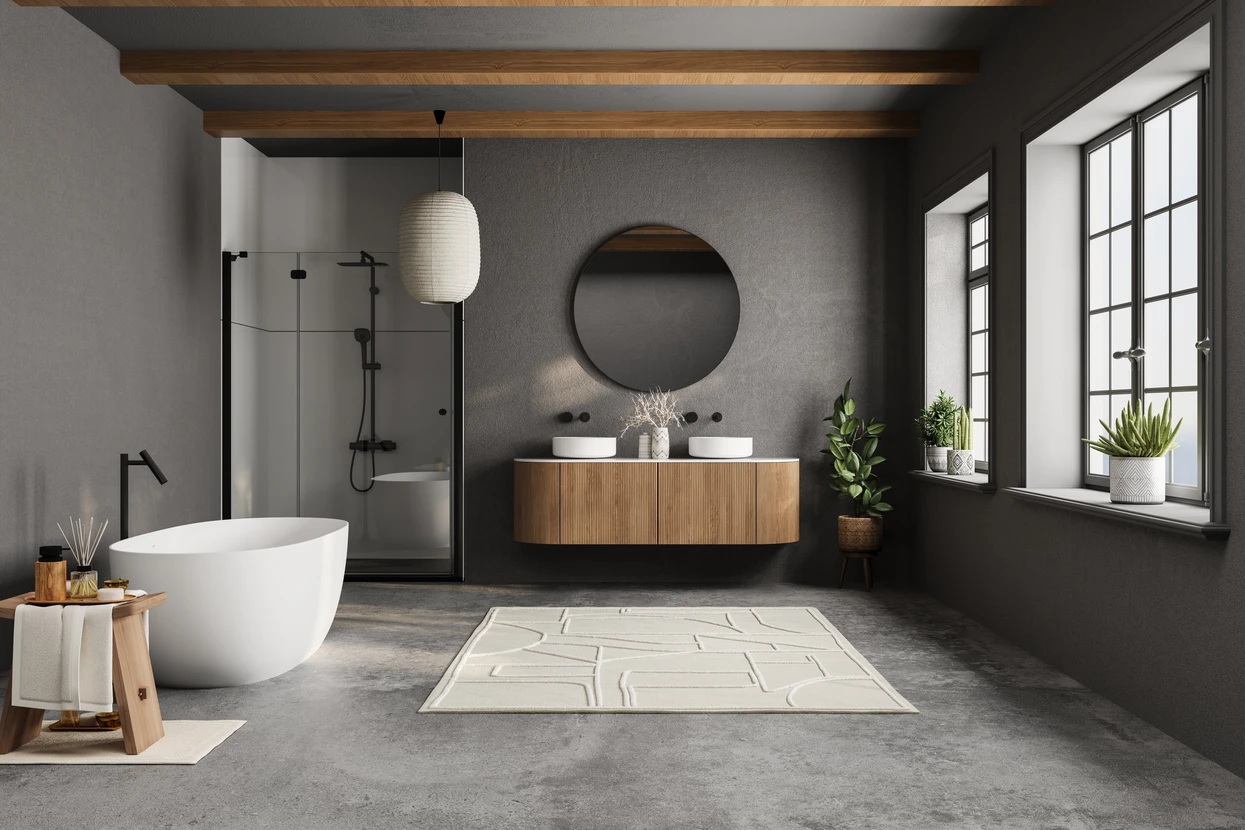 Salle de bains moderne avec un grande miroir et une baignoire